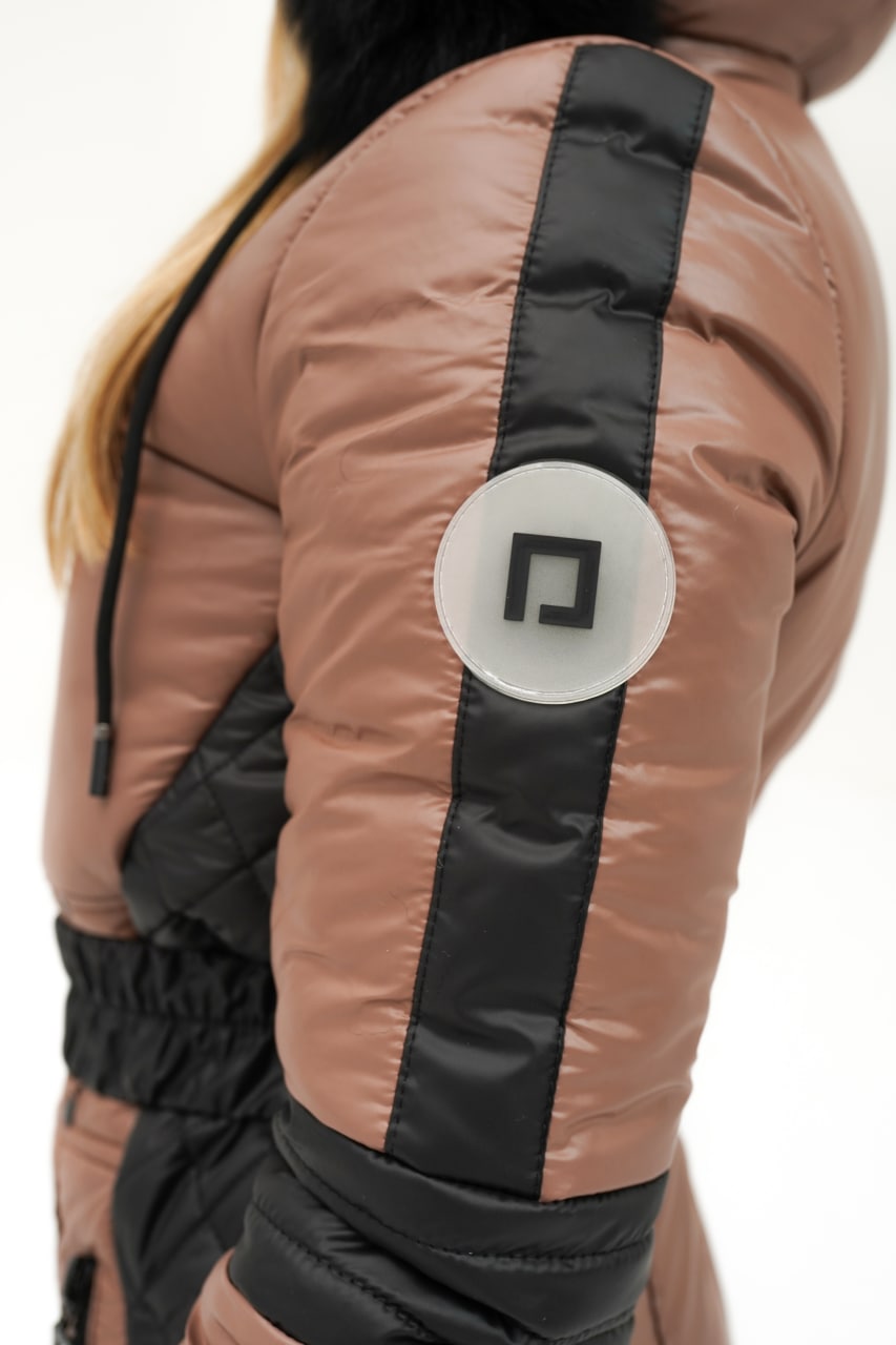 Brown puffer jacket with black accents and a logo on a white background
