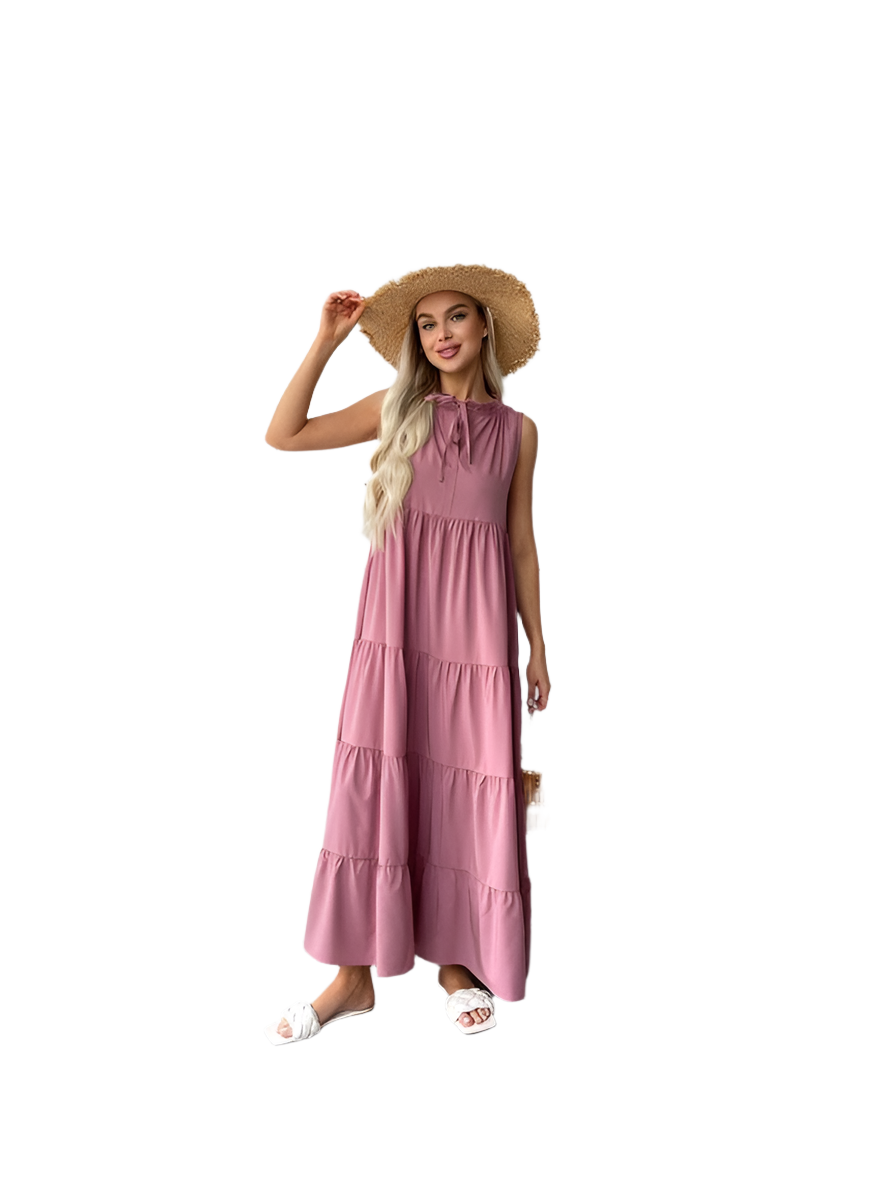 Woman wearing a pink dress and straw hat on a white background