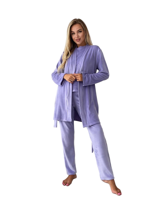 Woman wearing a lavender pajama set on a white background