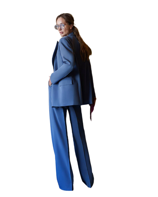 Woman wearing a blue suit on a white background