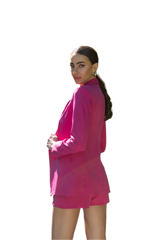 Woman wearing a pink outfit on a white background