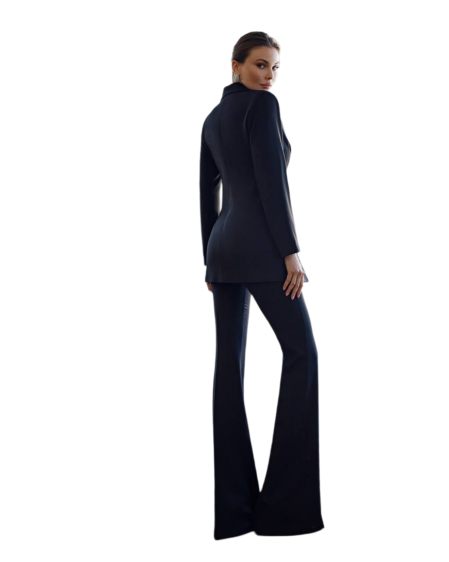 Woman wearing a black suit on a white background