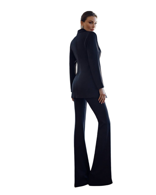 Woman wearing a black suit on a white background