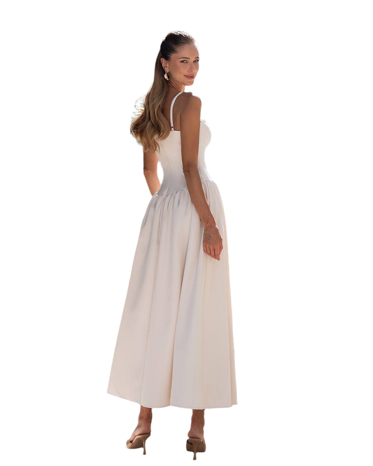 Woman wearing a white dress on a white background