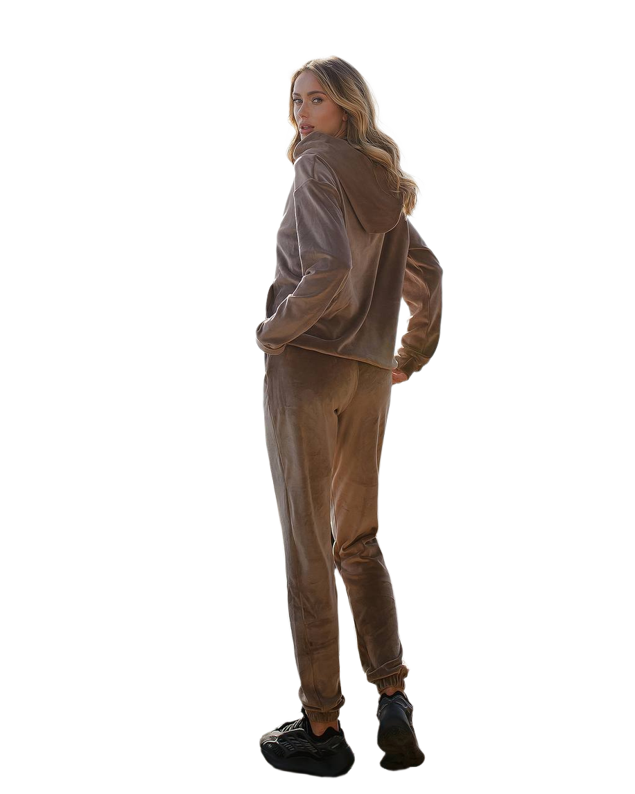 Woman wearing a brown jacket and pants on a white background