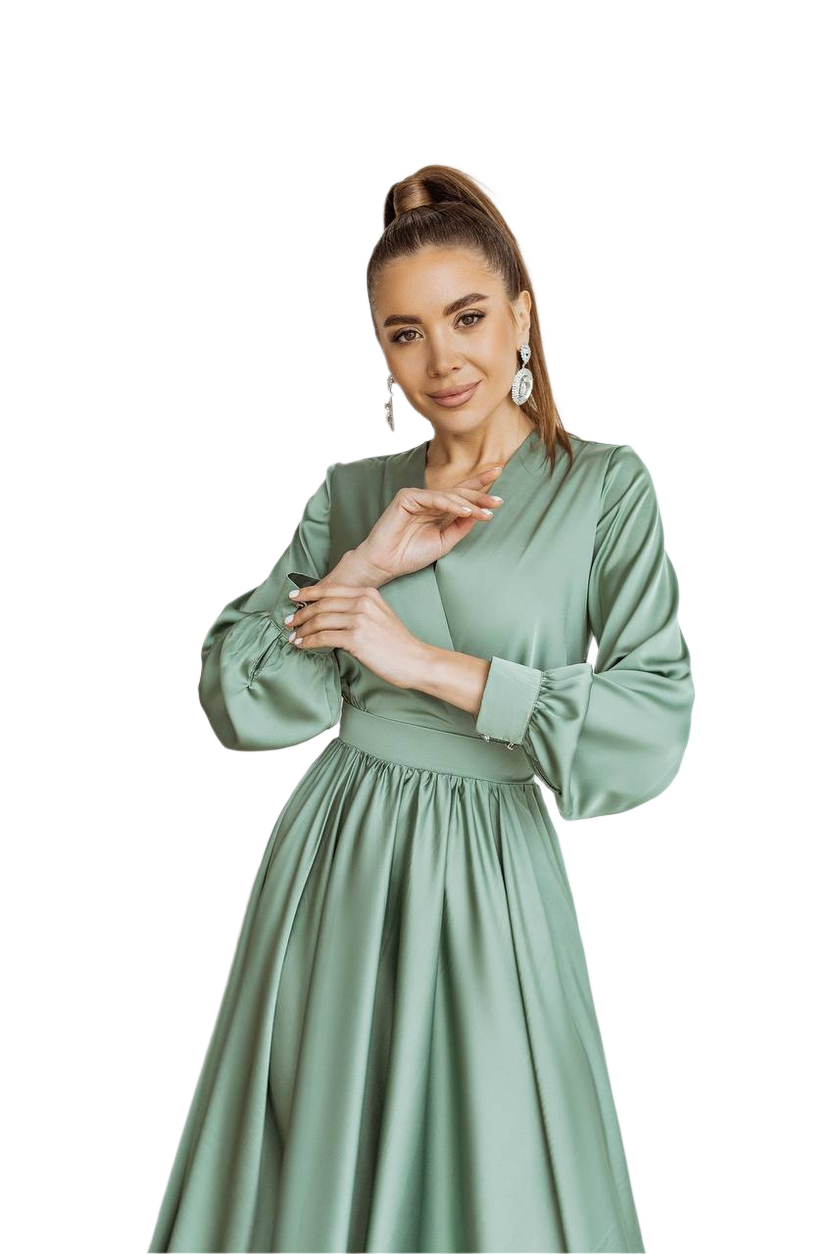Woman wearing a green dress on a white background