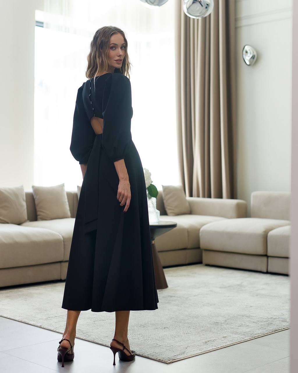 Elegant Midi Dress with Puff Sleeves and Cutout Back in Black
