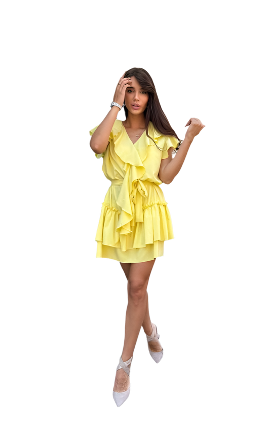 Woman wearing a yellow dress on a white background