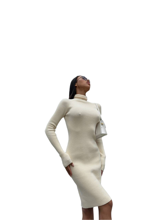 White long-sleeve dress worn by a model on a white background