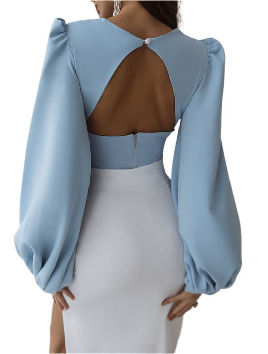 Light blue dress with sheer back on a white background