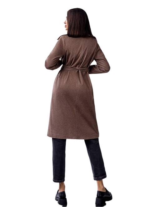 Woman wearing a brown coat on a white background