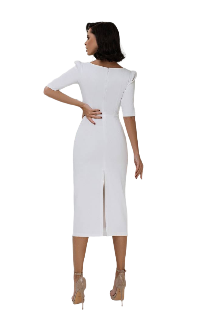 Woman wearing a white dress with a slit on a white background