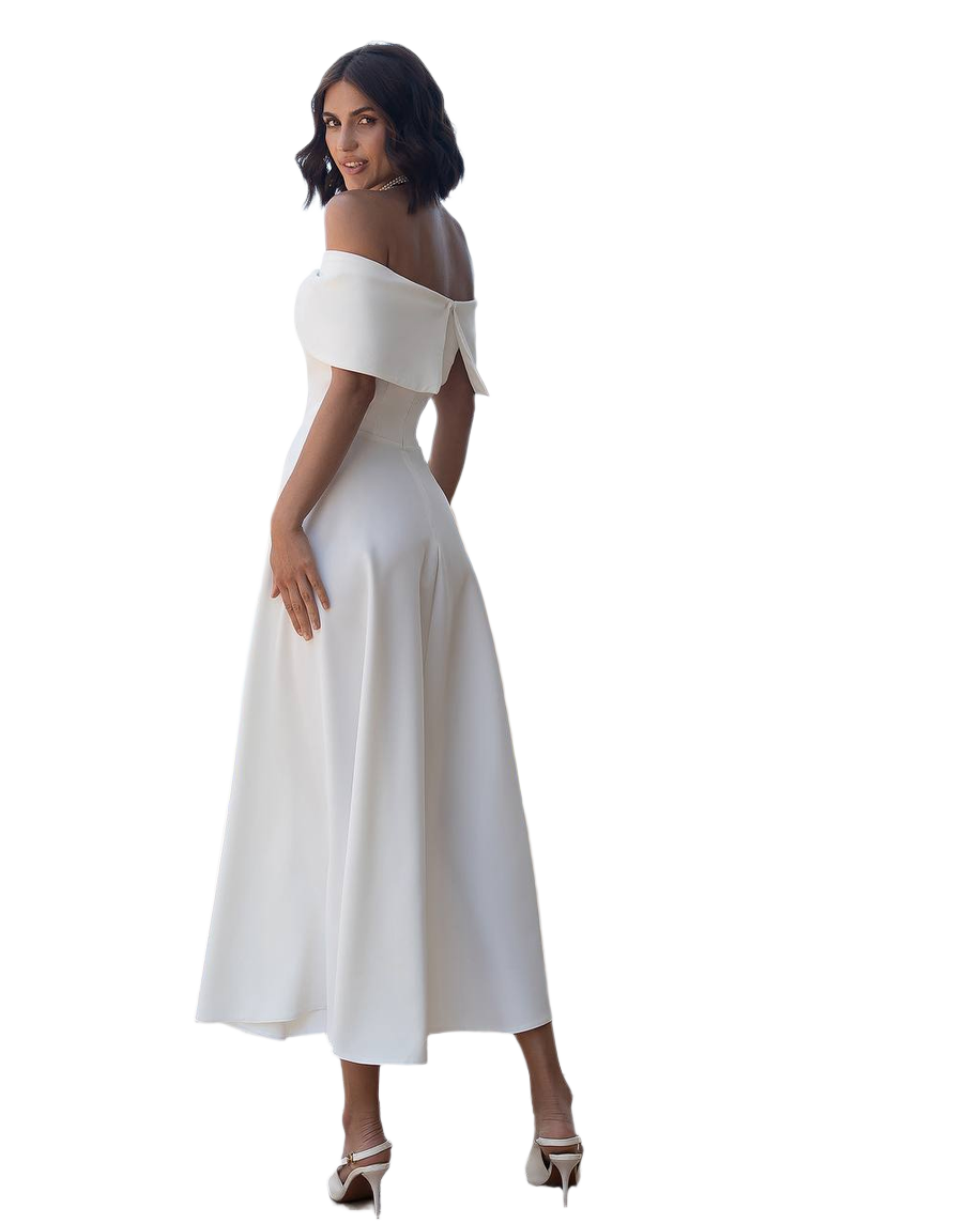 Woman wearing a white off-shoulder dress on a white background