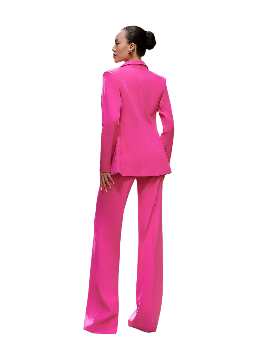 Person wearing a bright pink suit on a white background