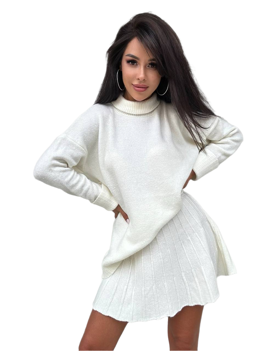 Woman wearing a white sweater dress on a white background