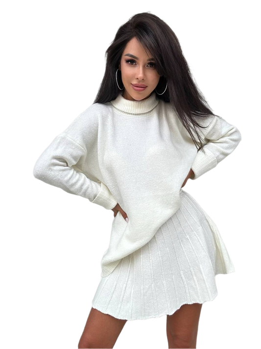 Woman wearing a white sweater dress on a white background