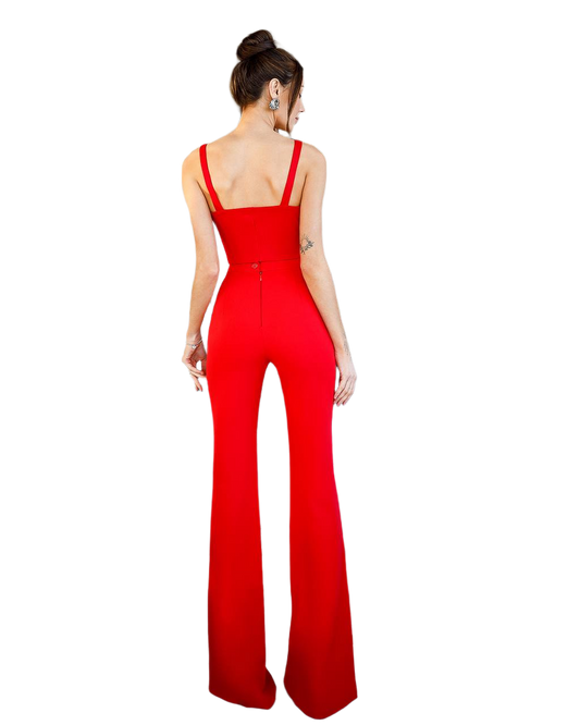 Red jumpsuit worn by a model on a white background