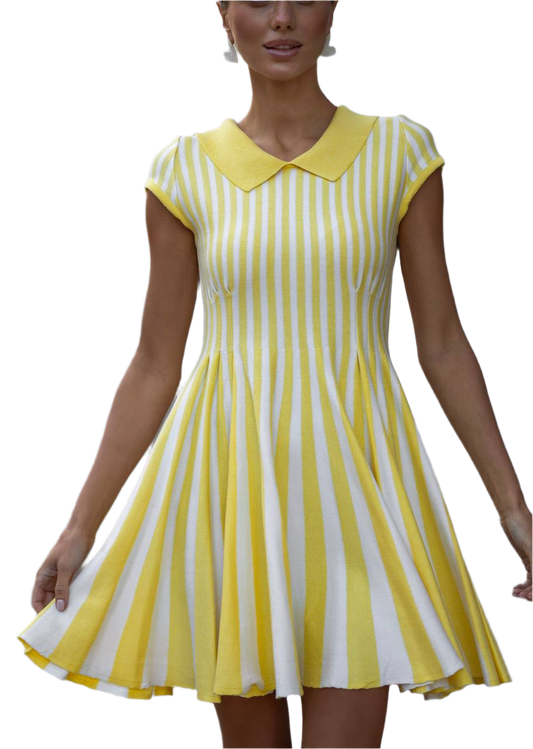 Woman wearing a yellow and white striped dress on a white background