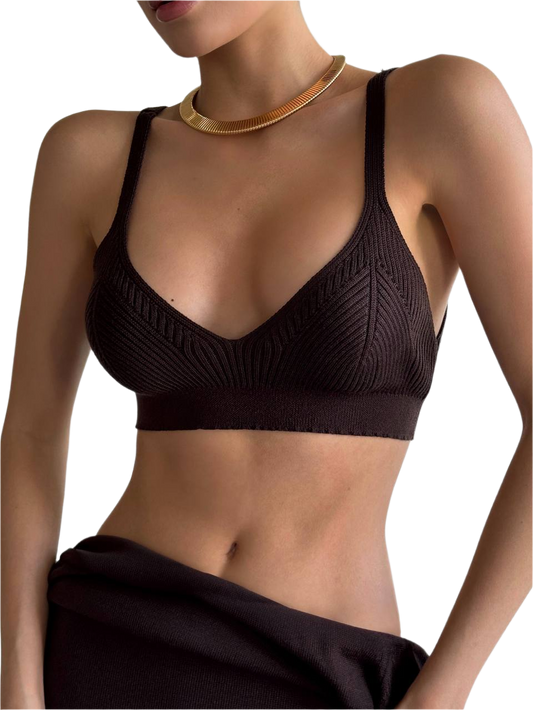 Black textured bralette worn by a model on a white background