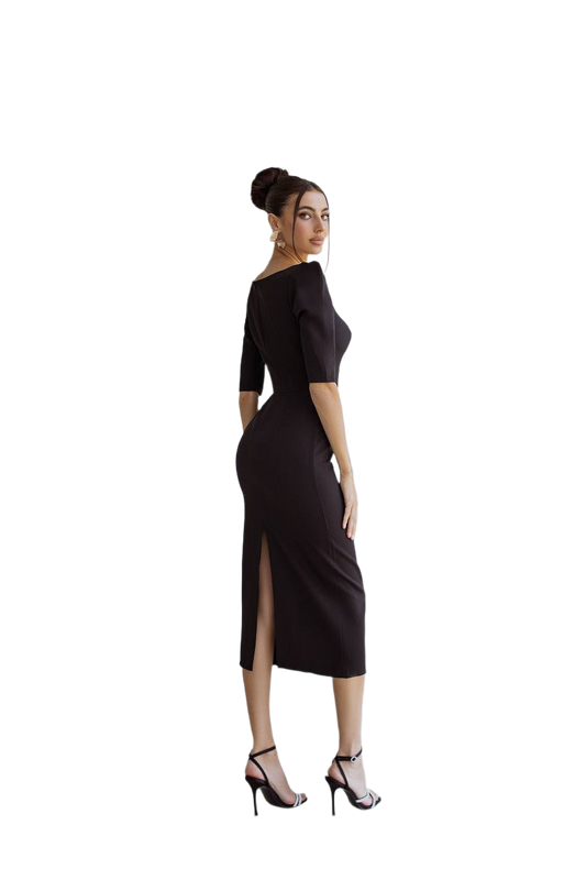 Woman wearing a black dress with a slit on a white background