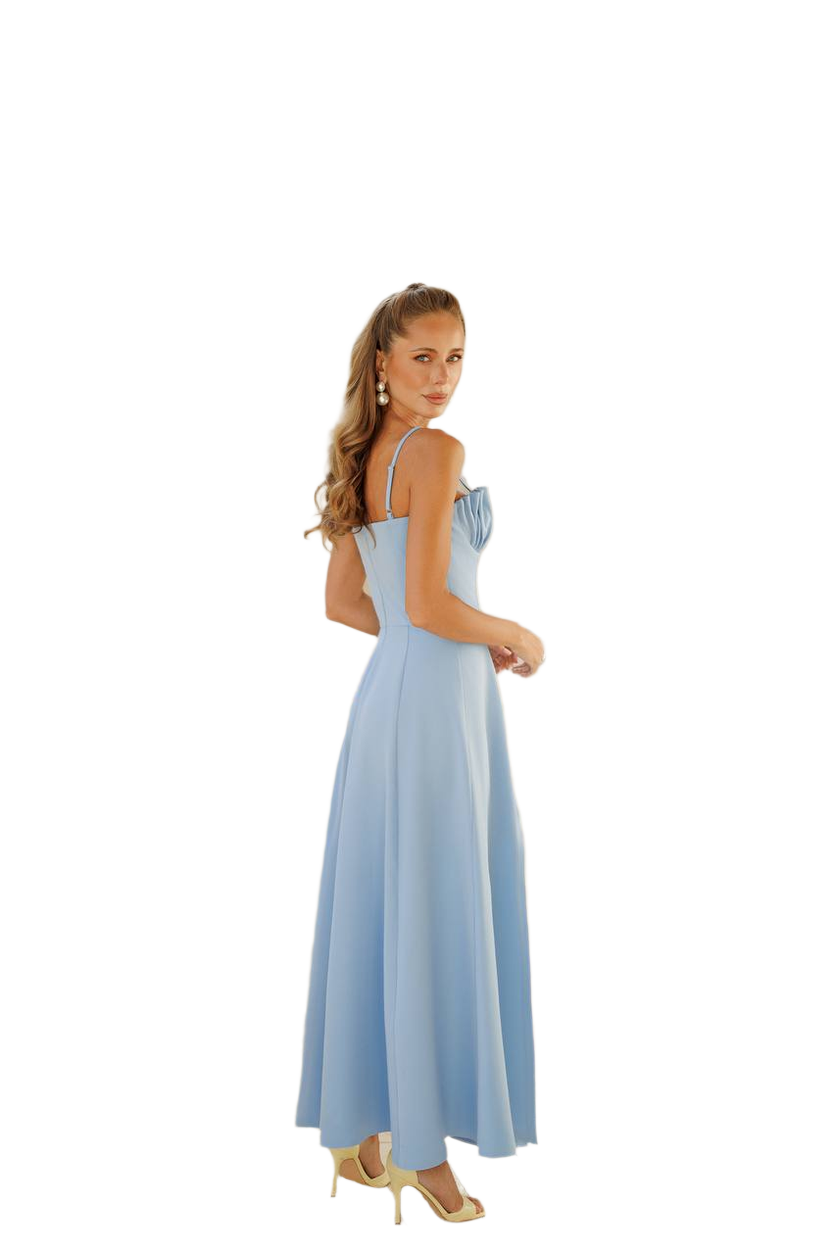 Woman wearing a light blue dress on a white background