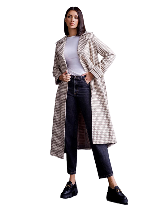 Woman wearing a checkered coat on a white background