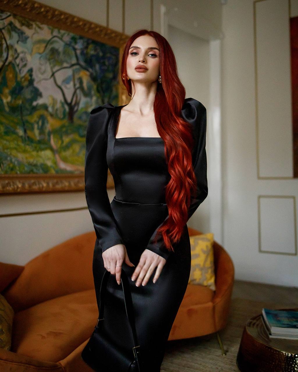 Elegant Backless Black Satin Dress with Long Sleeves and Slit