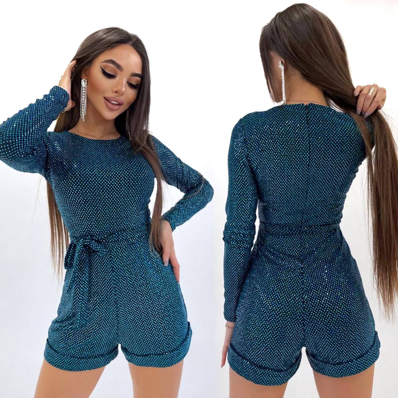 Woman wearing a blue textured romper with front and back views on a white background
