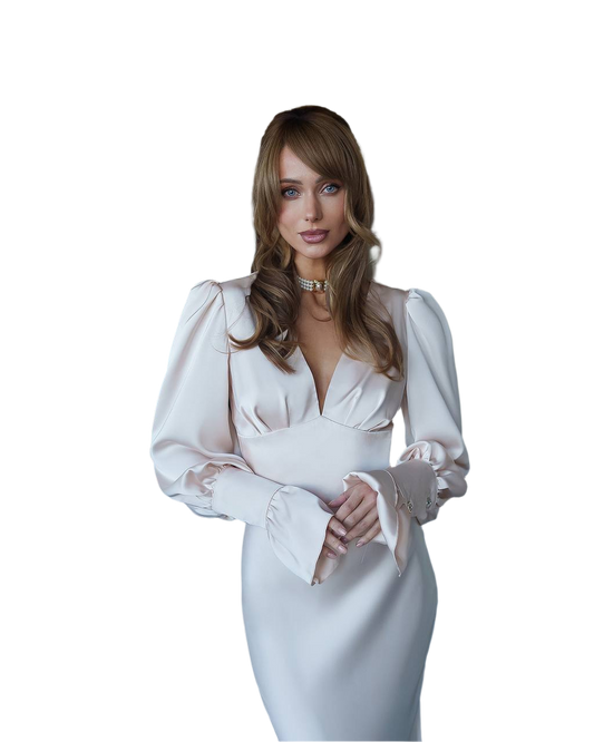 Woman wearing a white dress with long sleeves and gloves on a white background