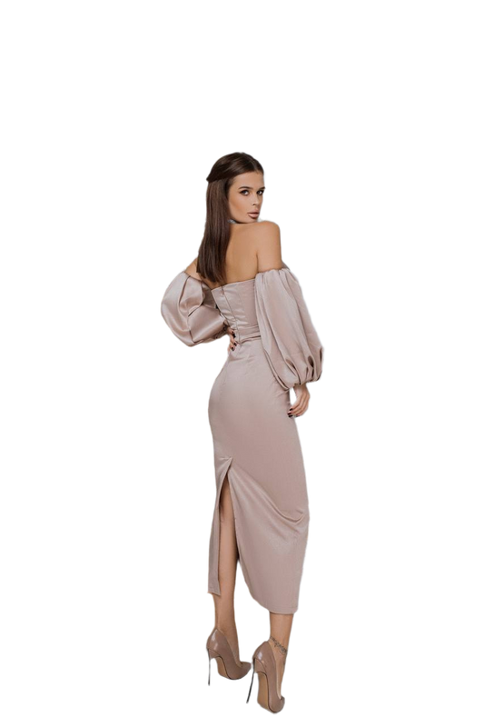 Woman wearing a beige off-shoulder dress with a slit on a white background