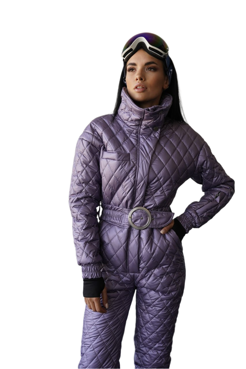 Person wearing a purple quilted snowsuit with goggles on a white background