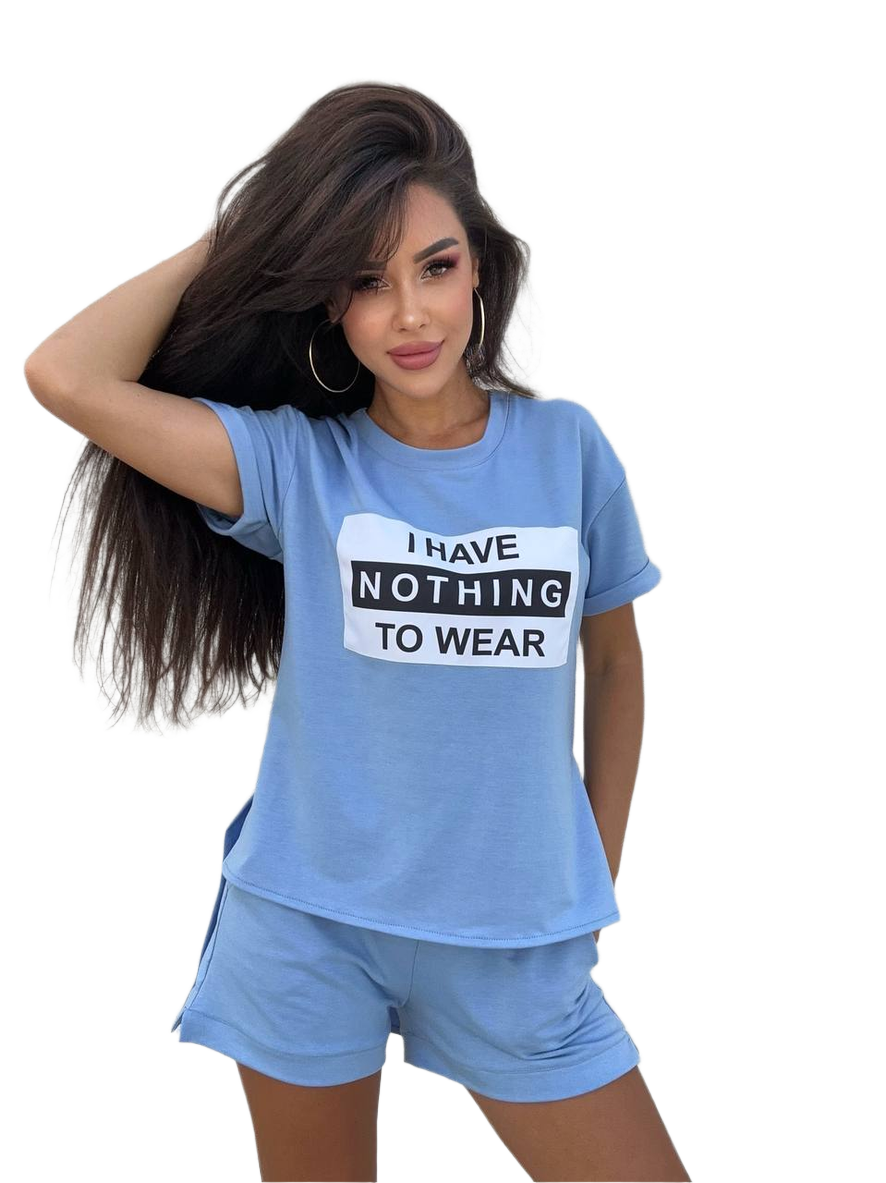 Woman wearing a blue t-shirt with 'I HAVE NOTHING TO WEAR' text and matching shorts on a white background