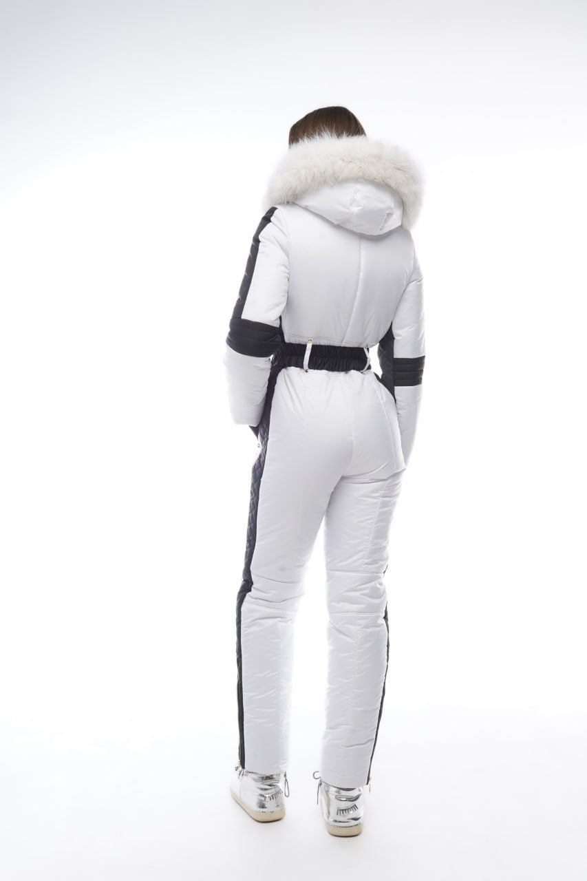 Person wearing a white ski suit with a hood on a white background