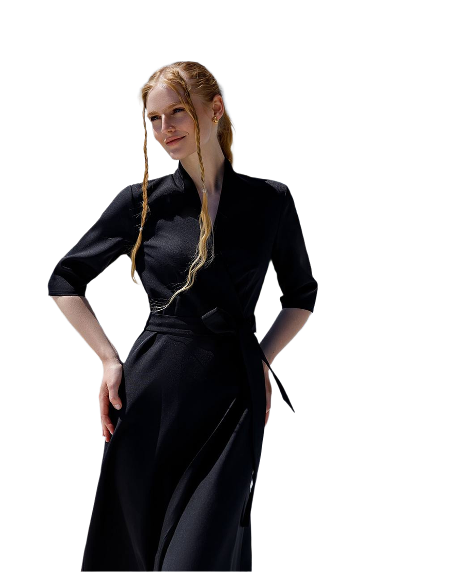 Woman wearing a black dress with a white background