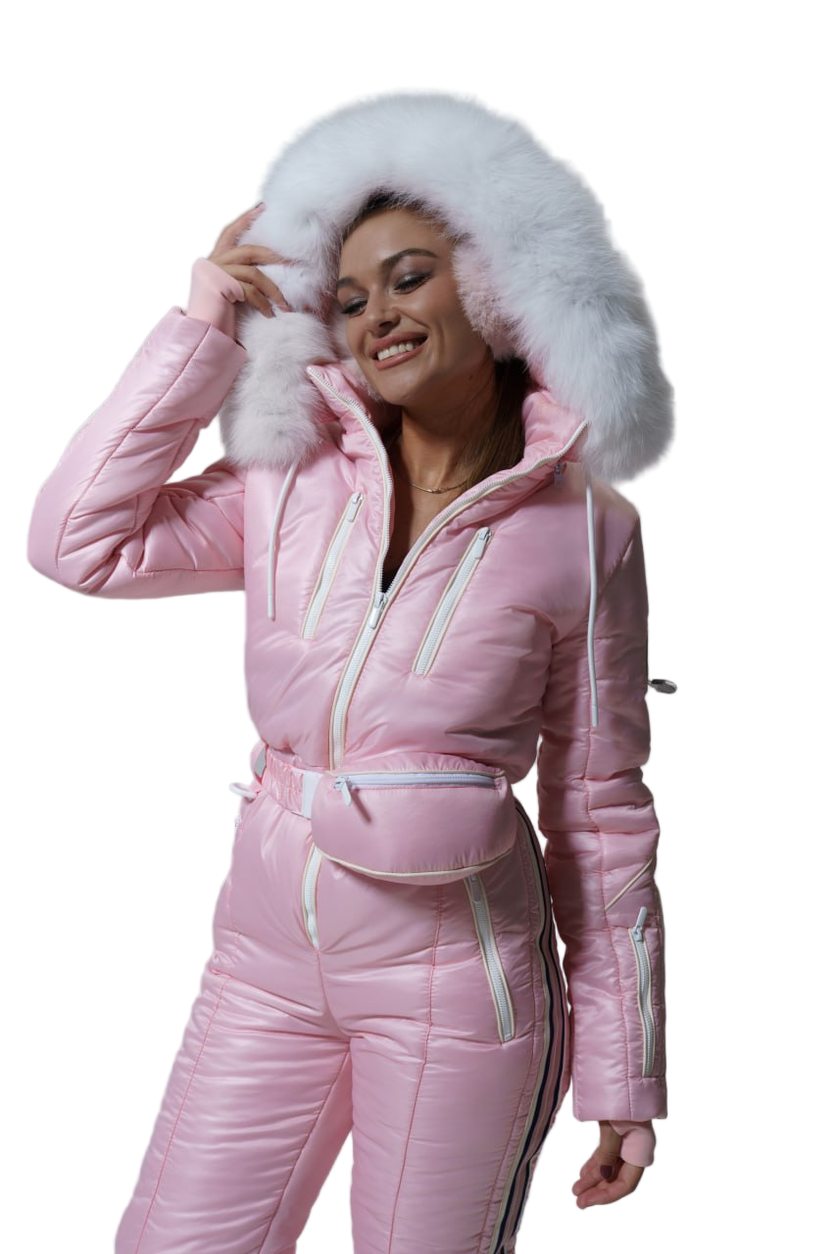 Woman wearing a pink snowsuit with a white fur hood on a white background