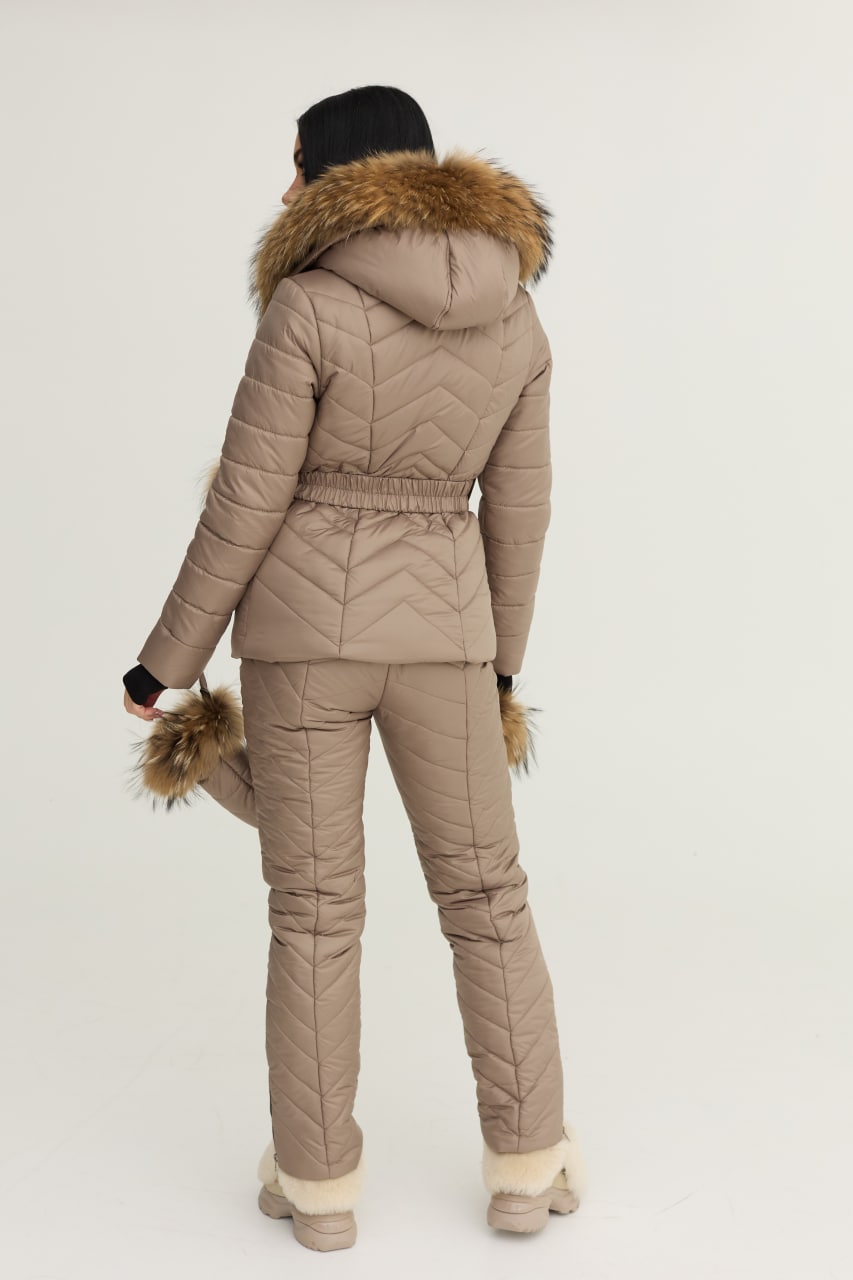 Beige winter coat with fur trim on a white background