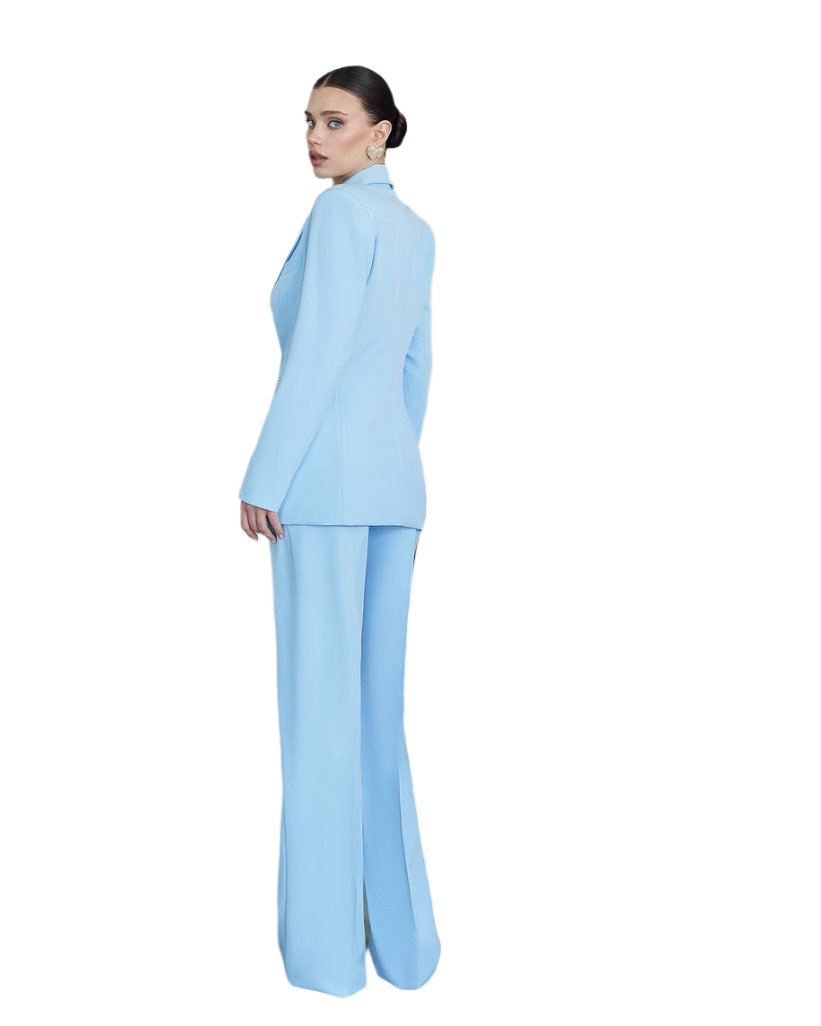 Woman wearing a light blue suit on a white background
