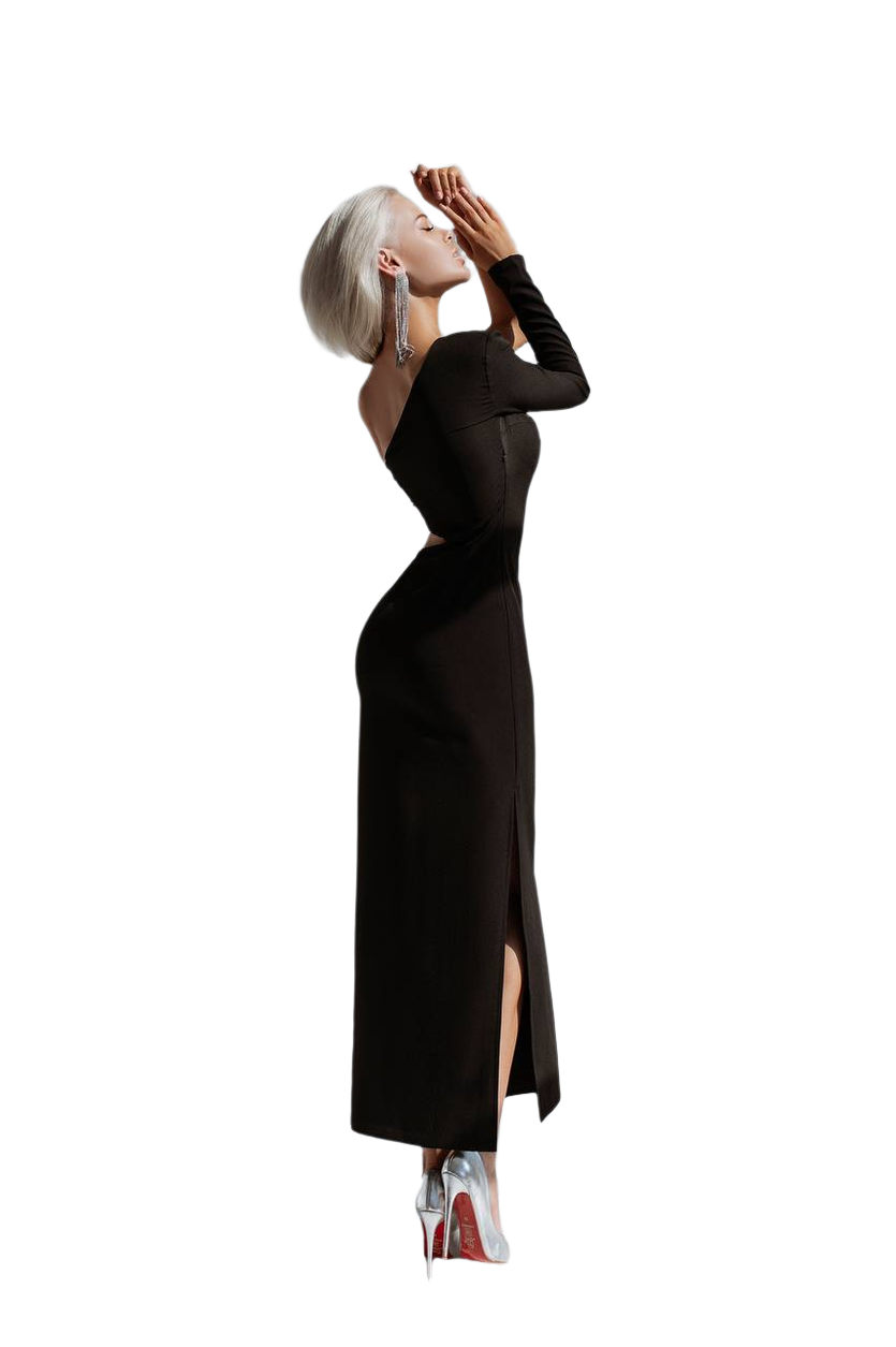 Woman wearing a black dress with a high slit on a white background