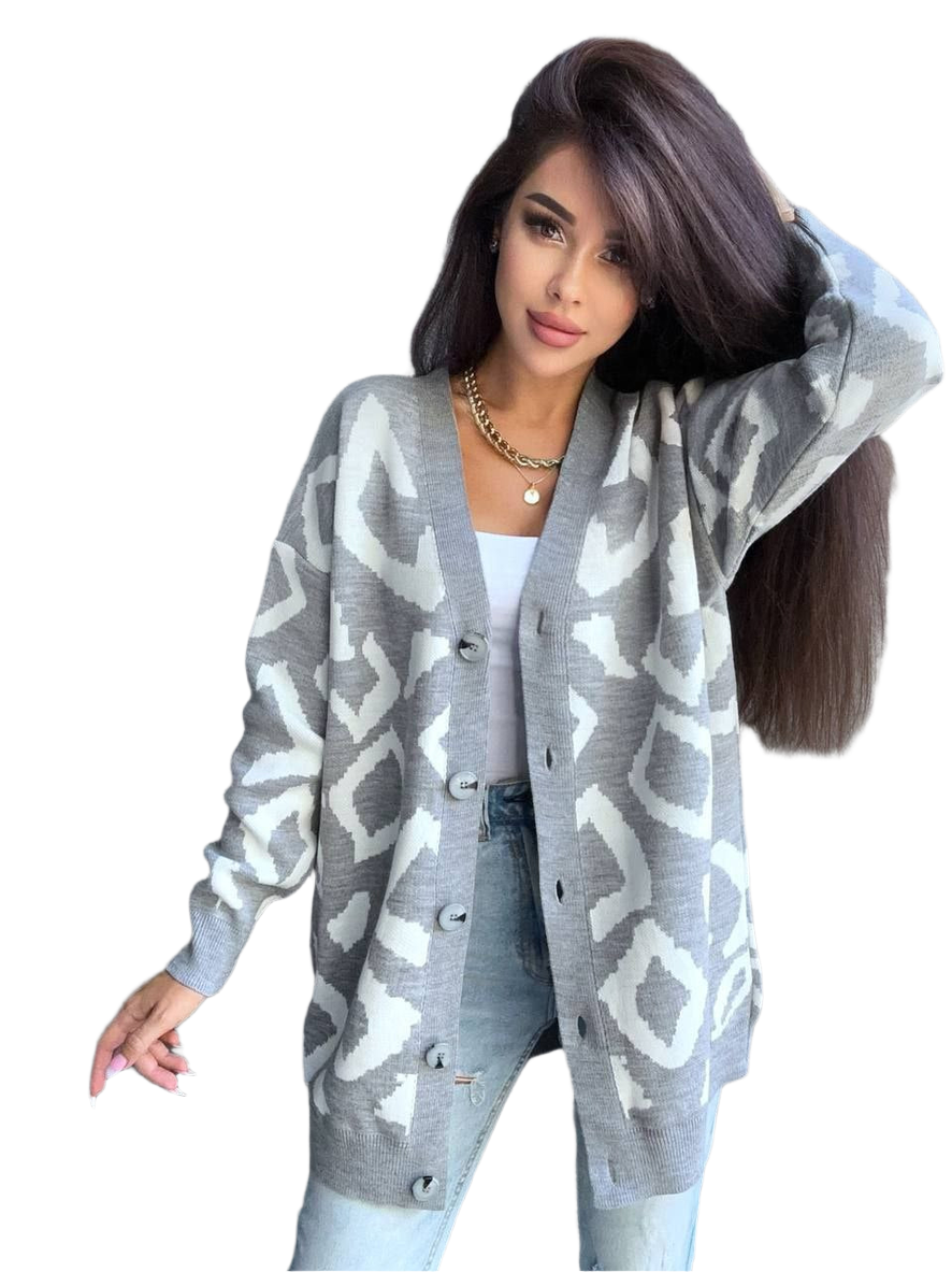 Woman wearing a gray patterned cardigan on a white background