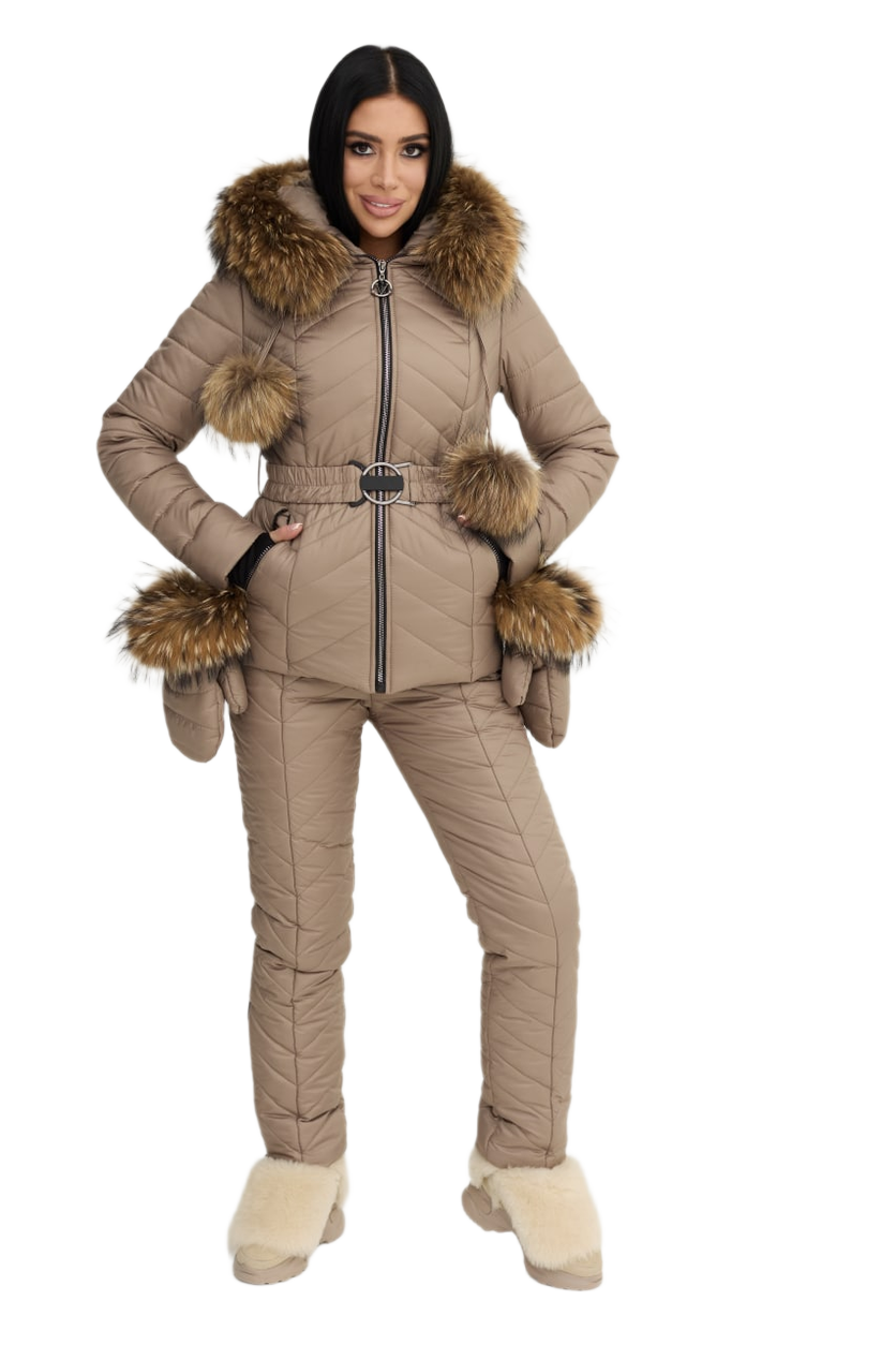 Woman wearing a beige winter snowsuit with fur accents on a white background