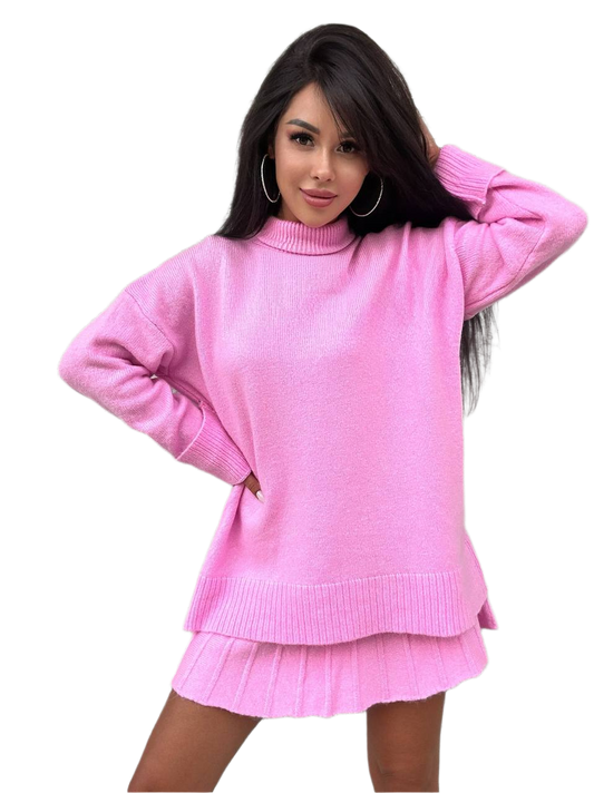 Woman wearing a pink sweater and skirt set on a white background