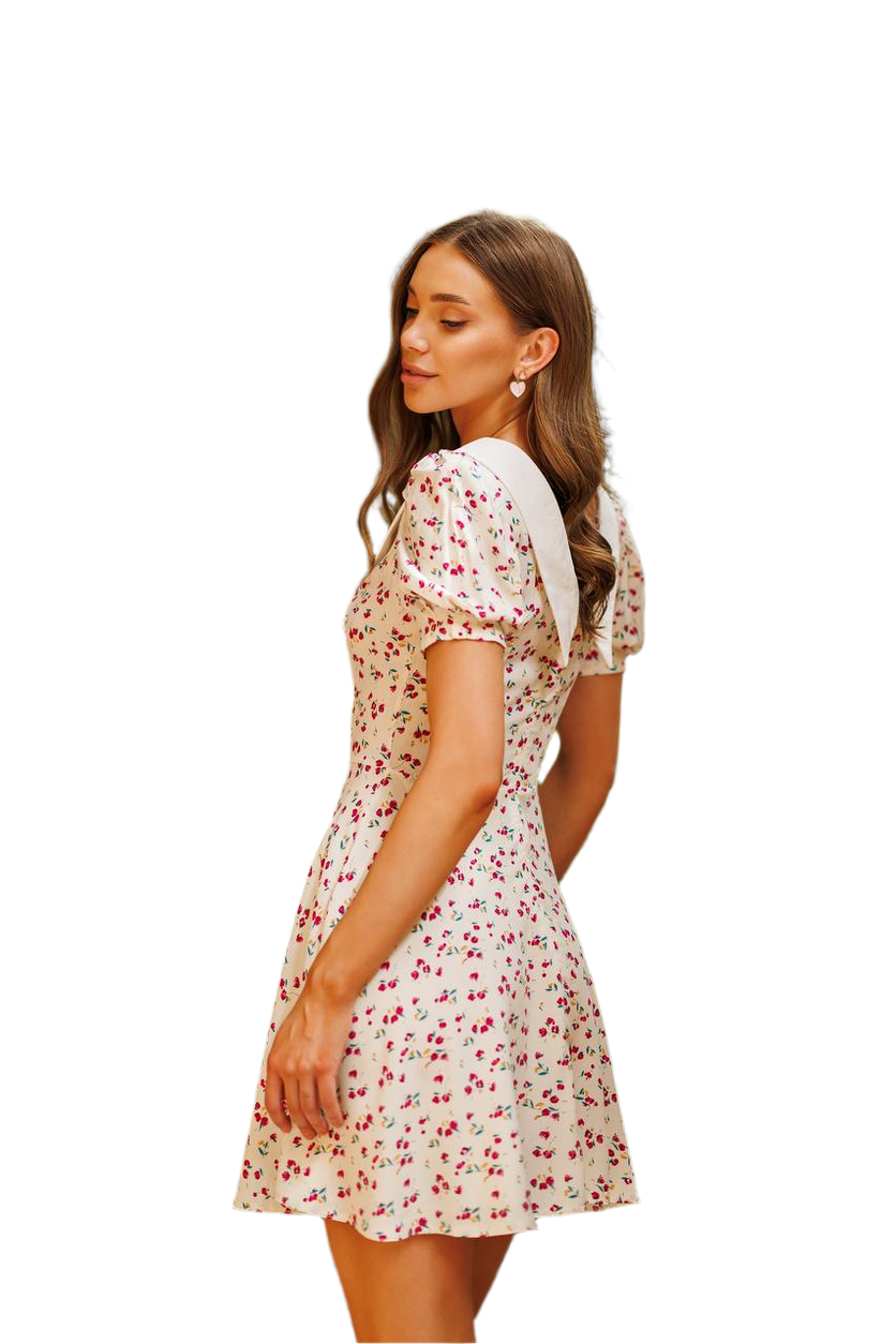 Woman wearing a floral dress on a white background