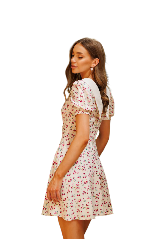 Woman wearing a floral dress on a white background