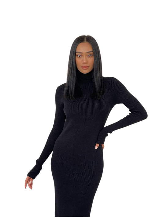 Woman wearing a black ribbed dress on a white background