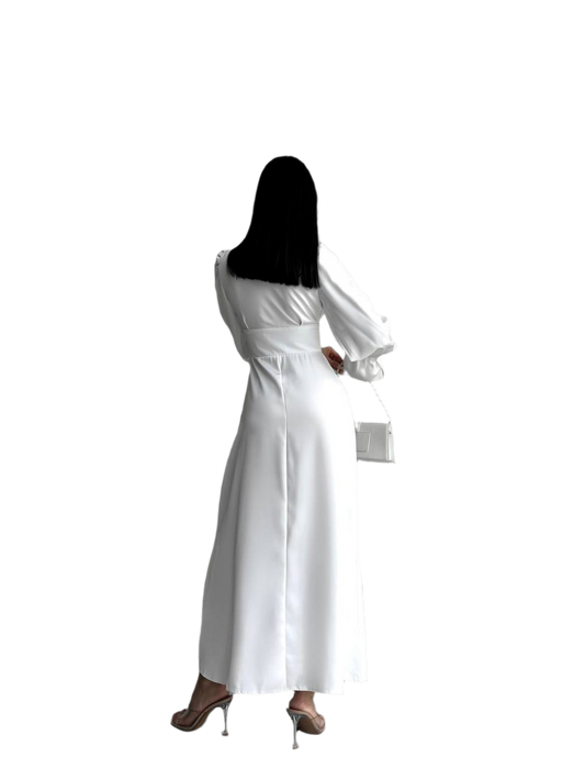 White dress with long sleeves on a white background