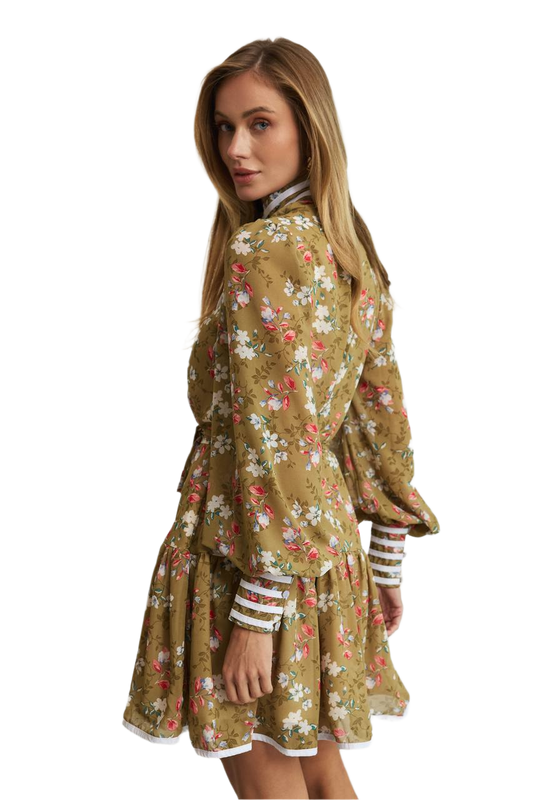 Woman wearing a floral dress with a white background