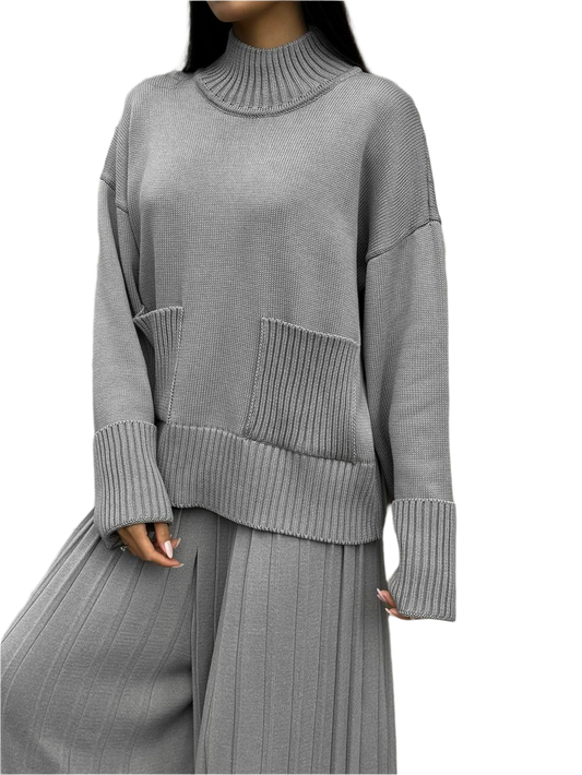 Gray ribbed sweater and pants set on a white background