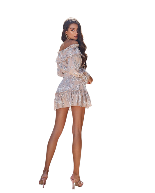 Woman wearing a floral off-shoulder dress on a white background