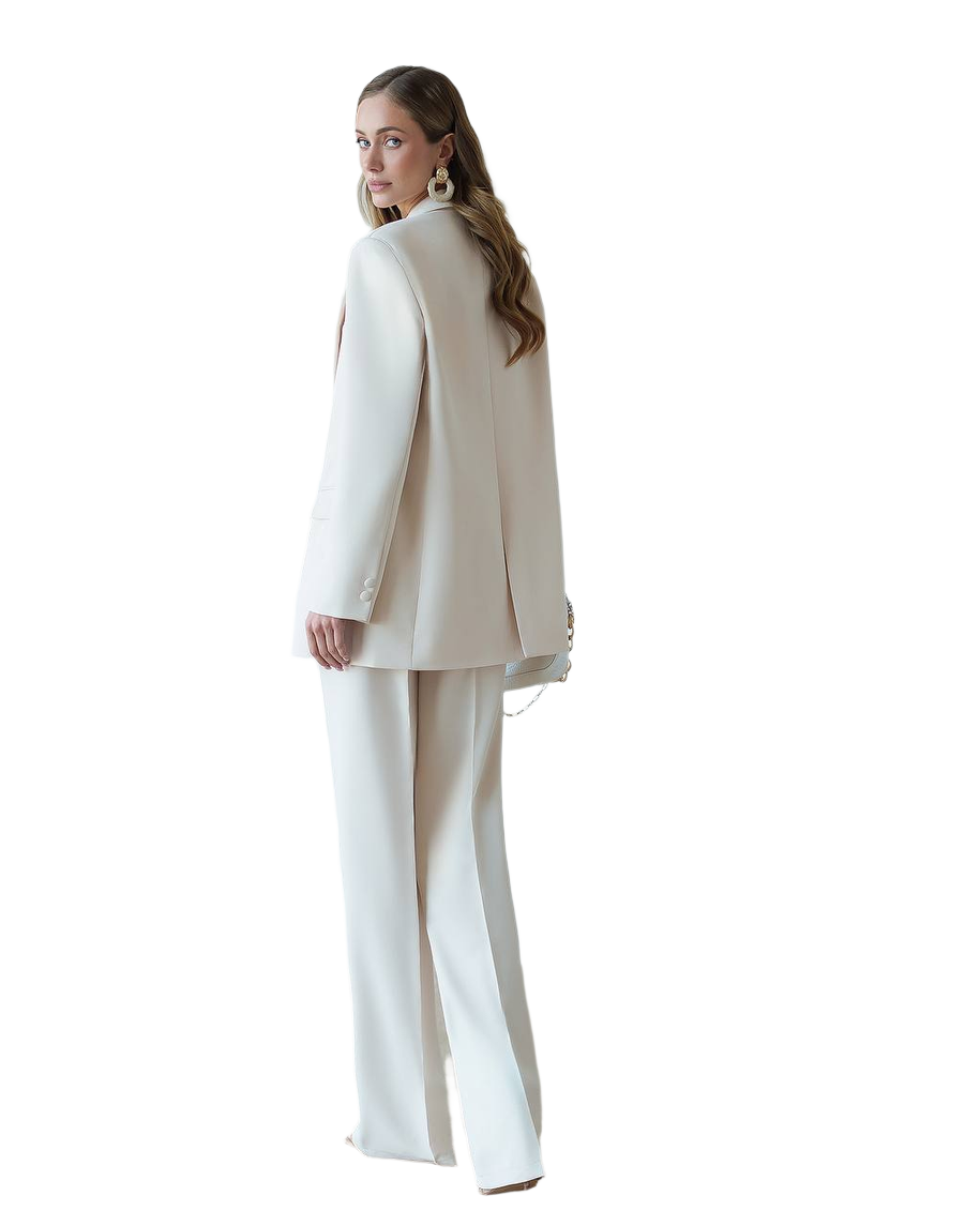 Woman wearing a beige suit on a white background