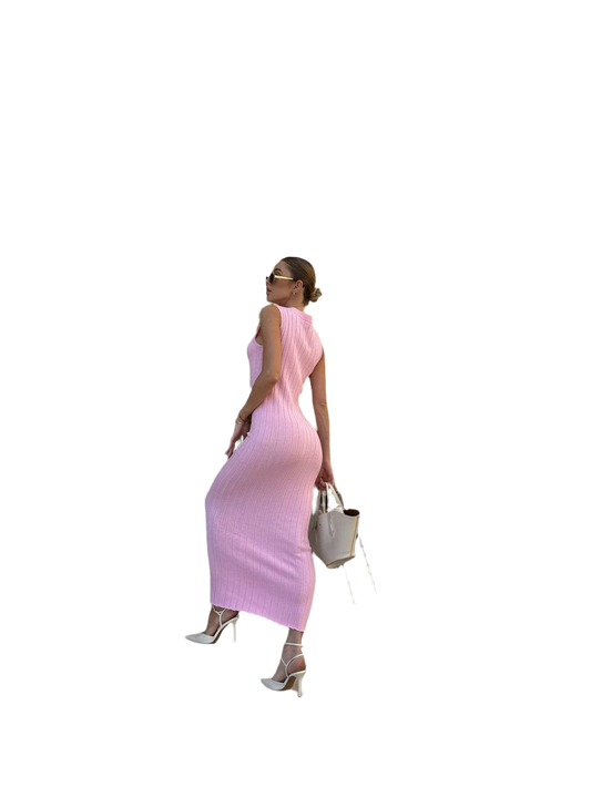 Woman wearing a pink dress on a white background